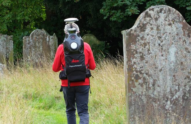 Churchyard surveyor with laser backpack